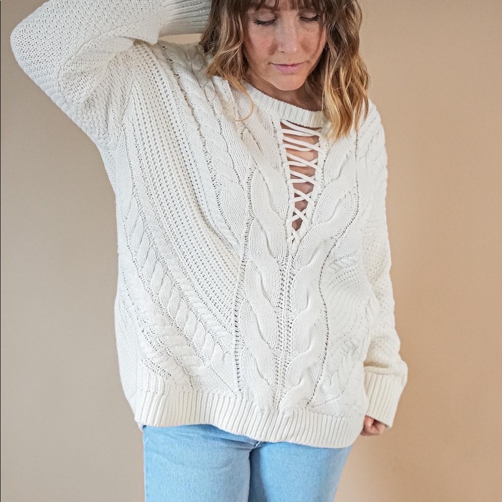 EXPRESS oversized cream colored v-neck knit sweater.